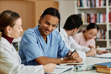 group of medical professionals studying together