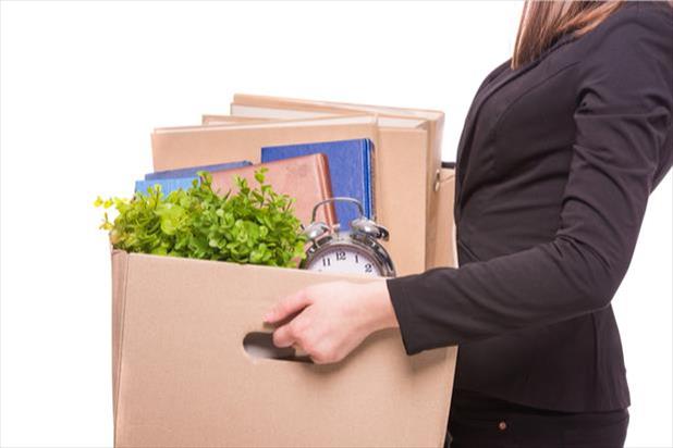 woman carrying a moving box
