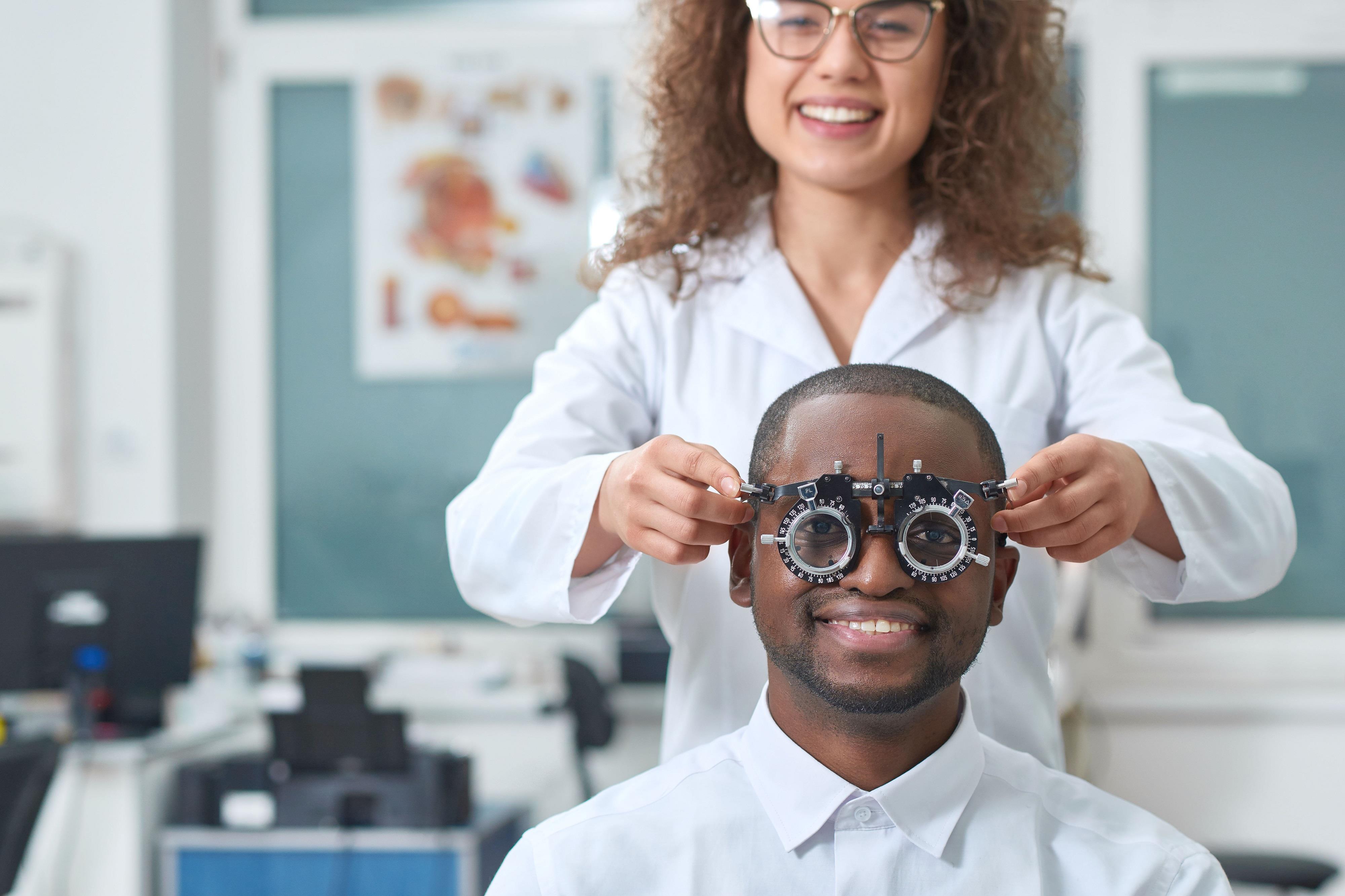 ophthalmic technician assessing a patient's vision
