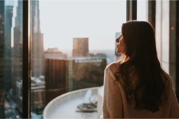 woman overlooking the city