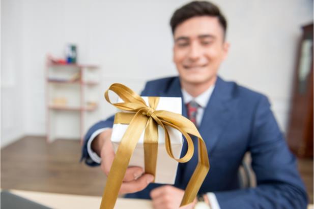 man giving a gift