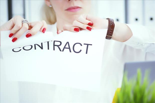 Woman tearing up contract