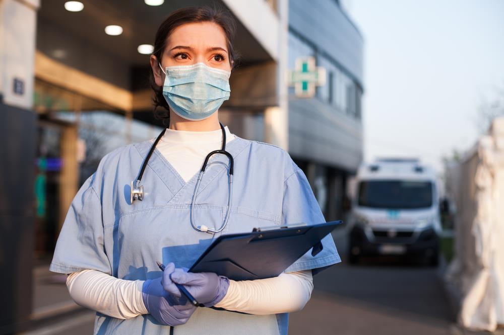 Healthcare worker with clipboard