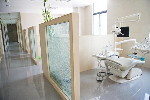 Interior view of an exam room at a modern dental office