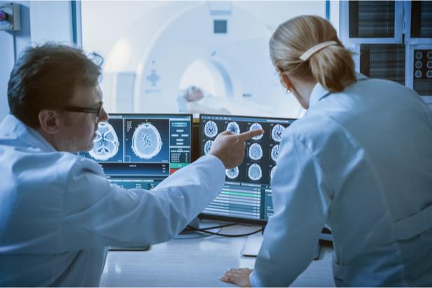 radiologists reviewing MRIs
