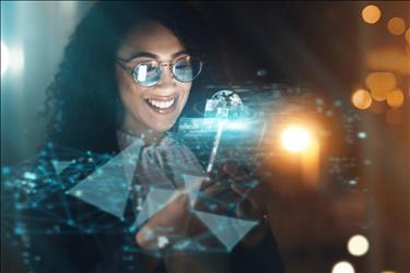 smiling woman with hologram and other computer images in front of her