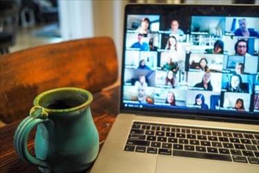 laptop showing a virtual meeting in progress