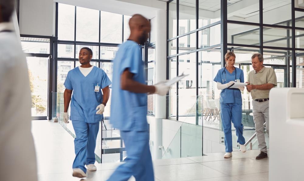 busy healthcare team walking the halls of a hospital