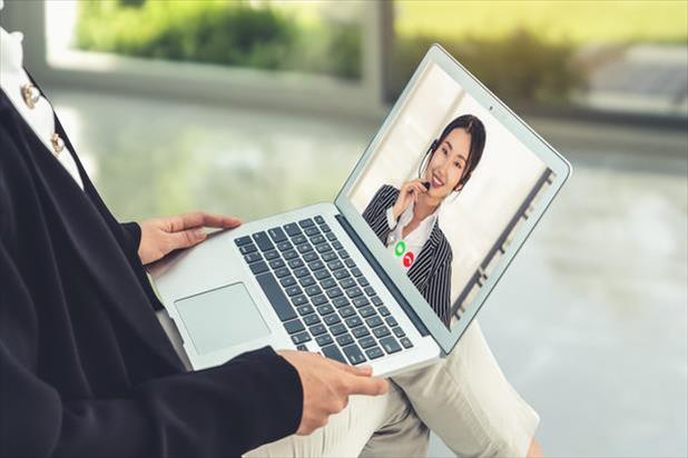 person interviewing via video conference