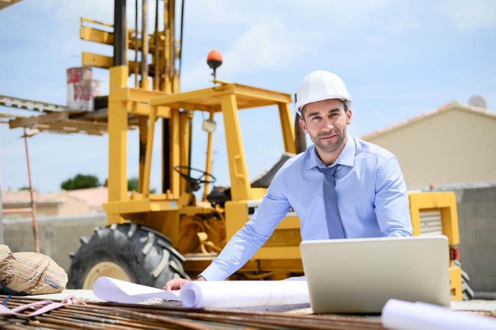 architect working at a construction site