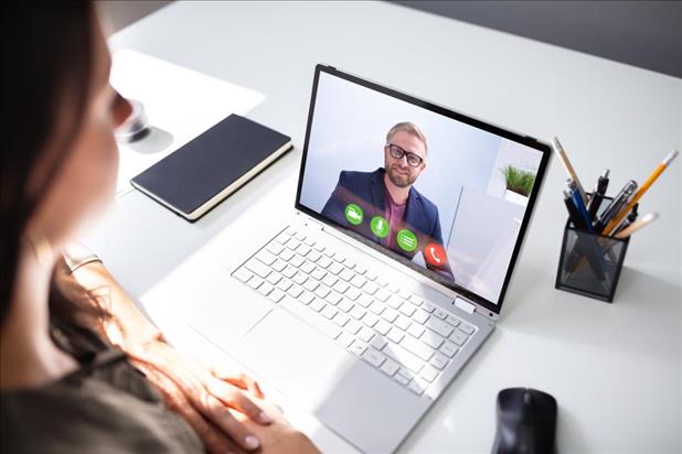 Job candidate and employer conducting a video interview