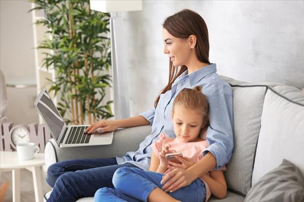 mom working from home with child