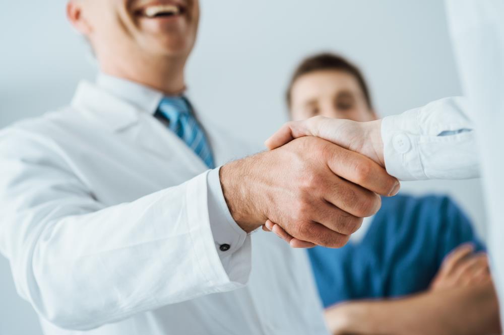 Doctor shaking hands